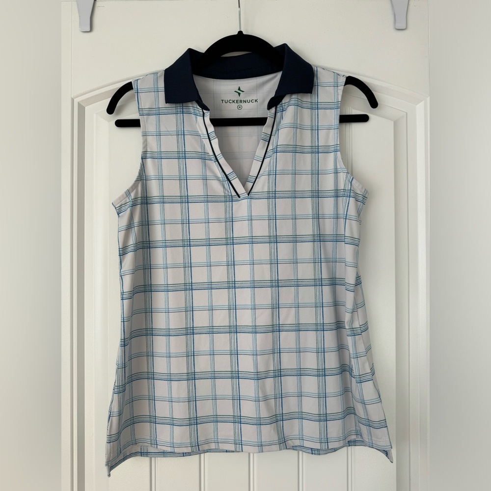 Blue and white plaid tuckernuck sleeveless golf shirt collared.